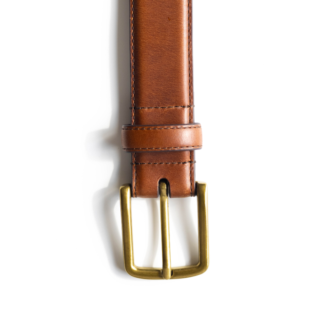 Cognac leather belt with a brass buckle
