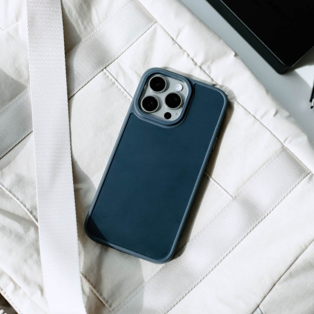 FRWD Cases - SOLSTICE phone case on a light fabric background