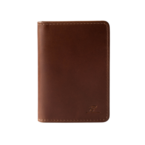 Brown leather wallet with a small embossed letter 'B' in the lower right corner, visible stitching along edges.