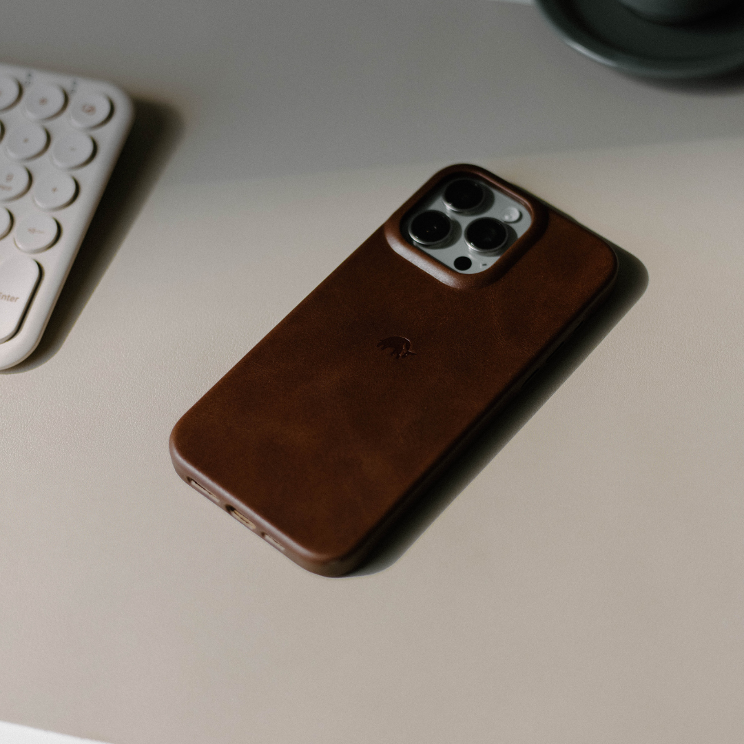 Brown leather iPhone case on a table
