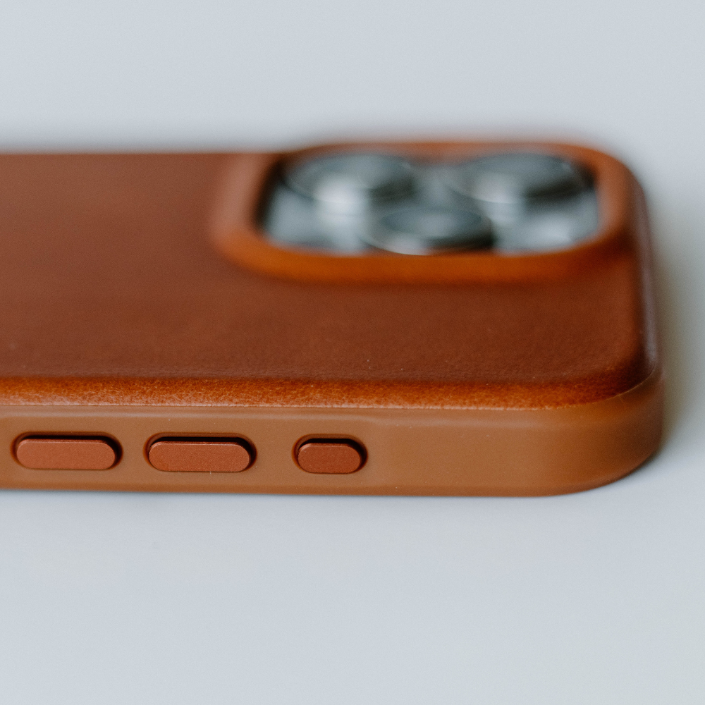 Close-up of the SIENNA Flex Case showing buttons and camera cutout
