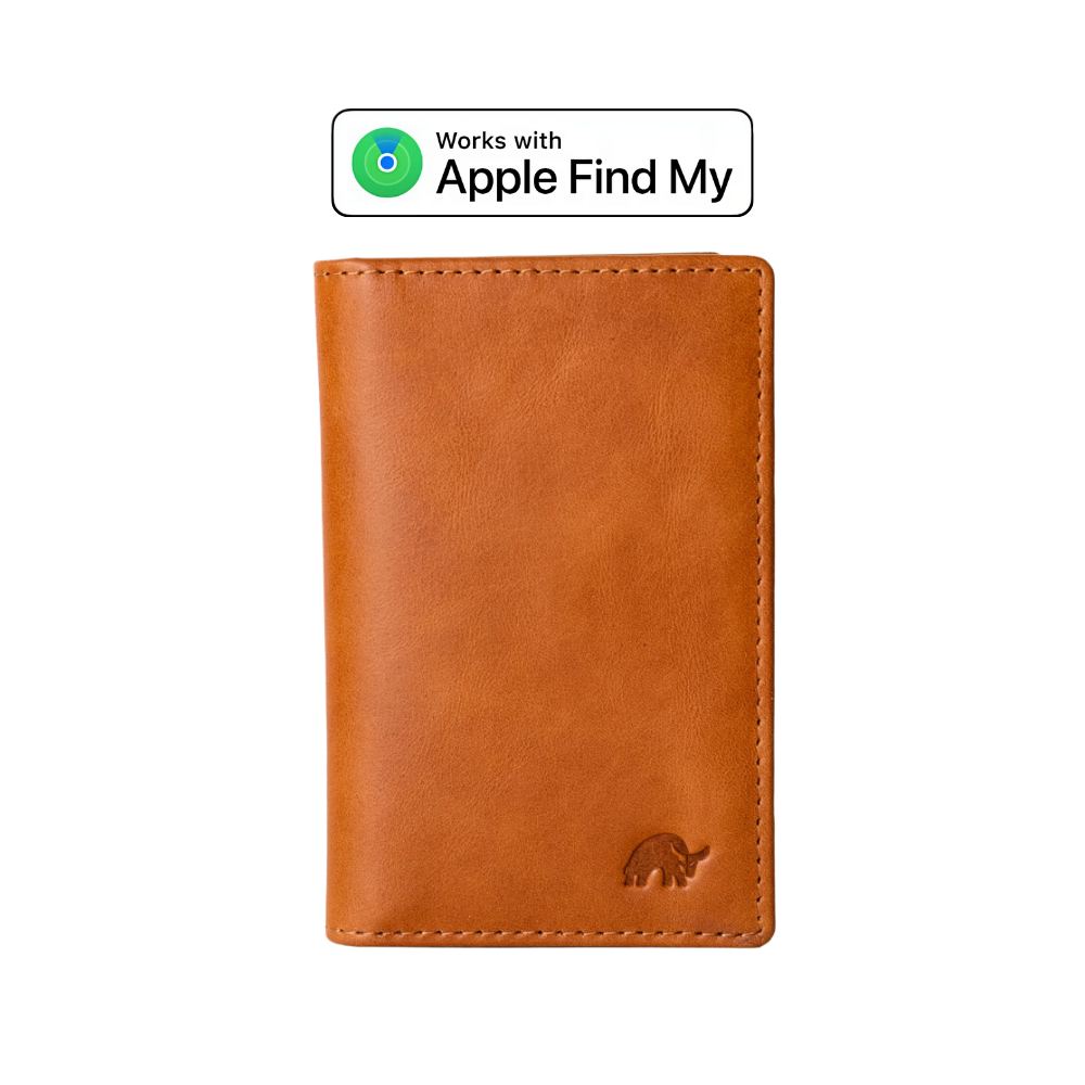 Brown leather wallet with embossed elephant logo below. Above it, a label reads 'Works with Apple Find My' with a green radar icon.