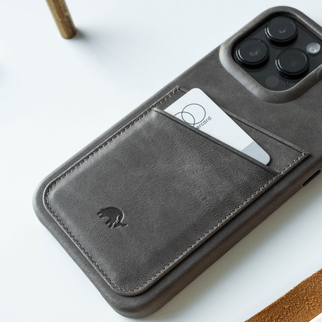 The Minimalist Portfolio Case in Slate color with a card in the slot