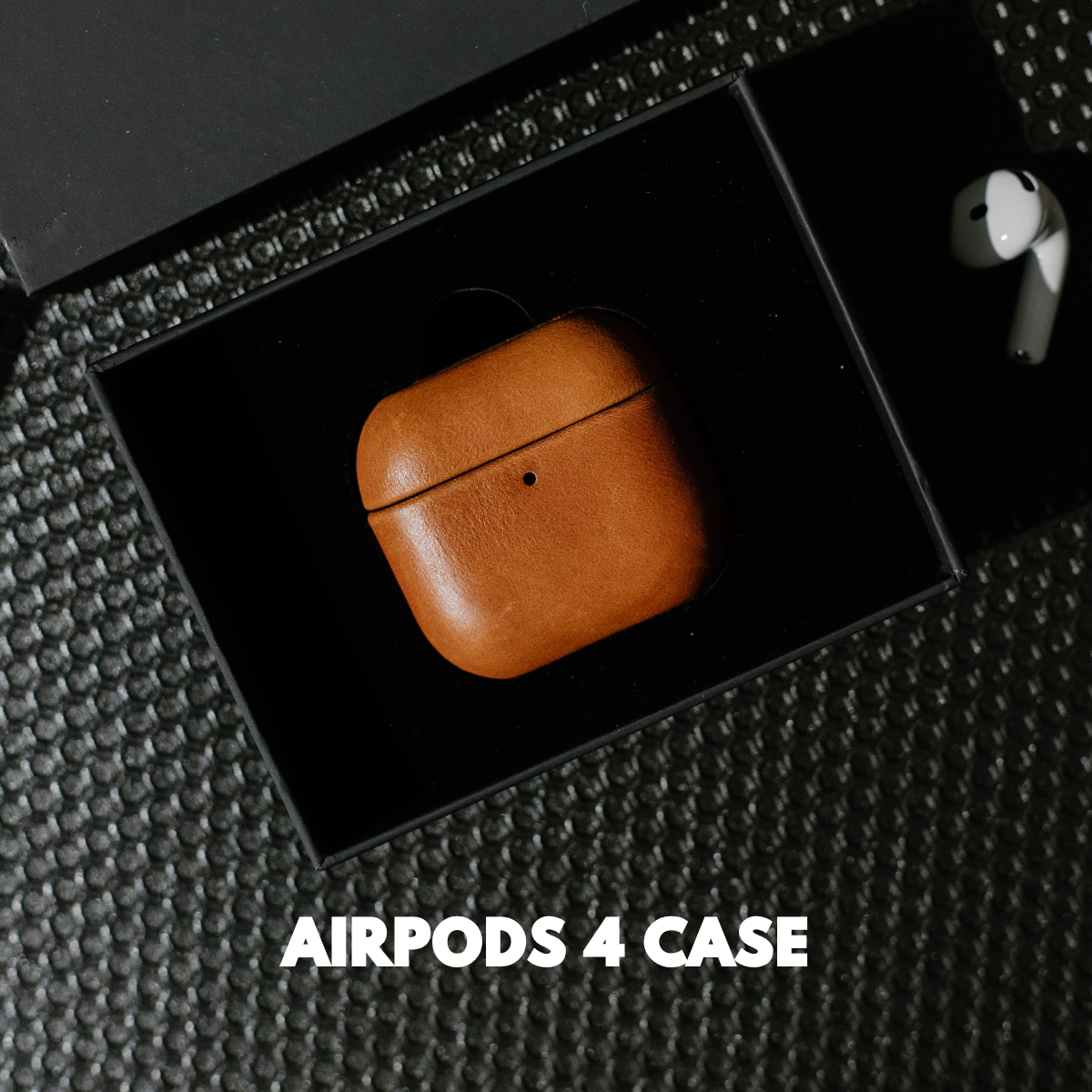 Brown leather AirPods case in a black box; white text 'AIRPODS 4 CASE' at bottom