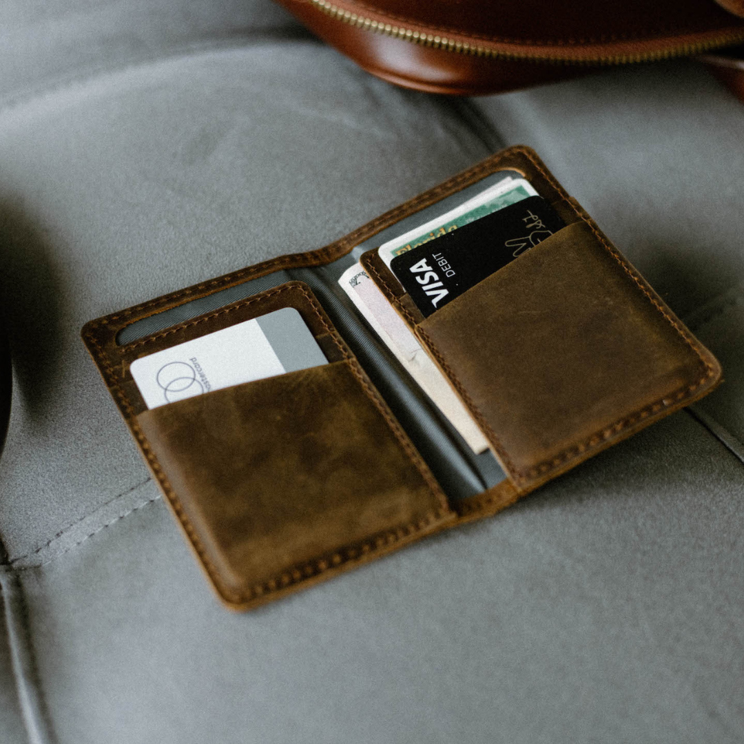 Open Messenger Wallet showing card slots and cash sleeve