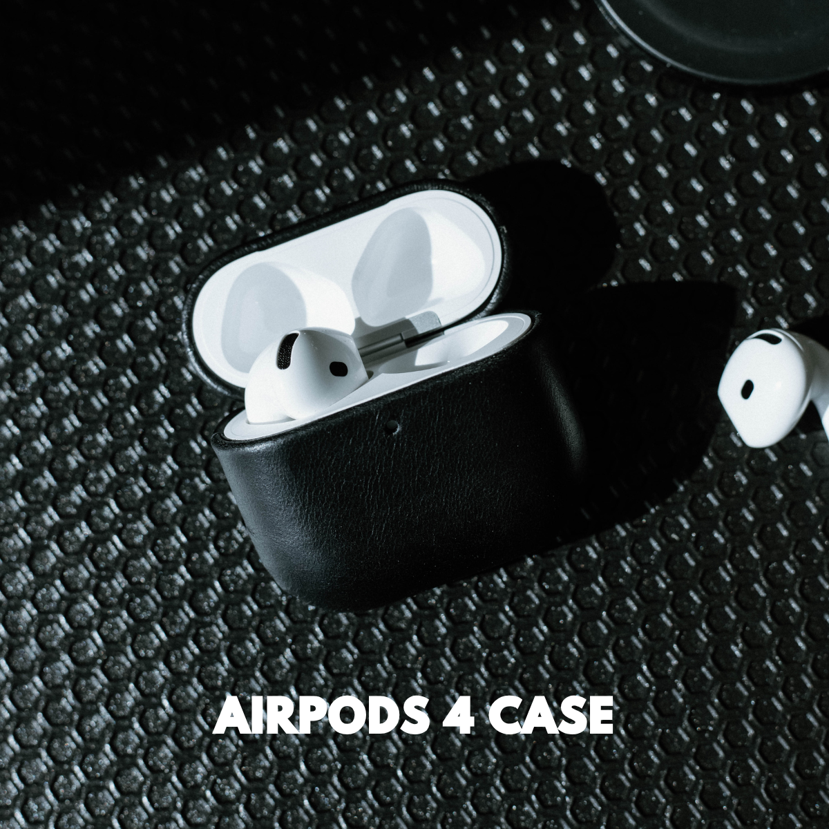 Black leather case for AirPods 4 with AirPods inside