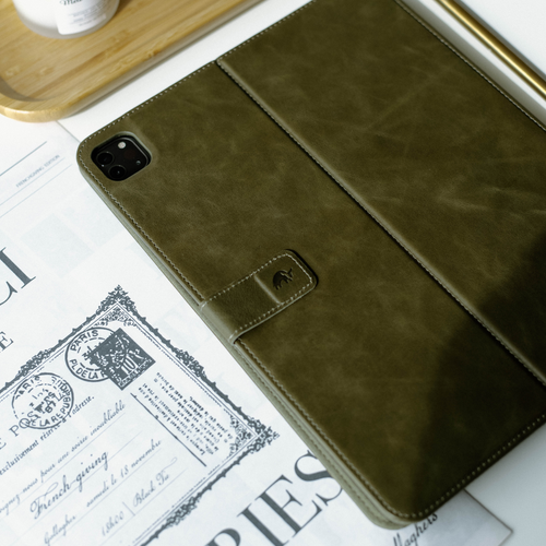 Olive green leather iPad case with a flap and embossed logo