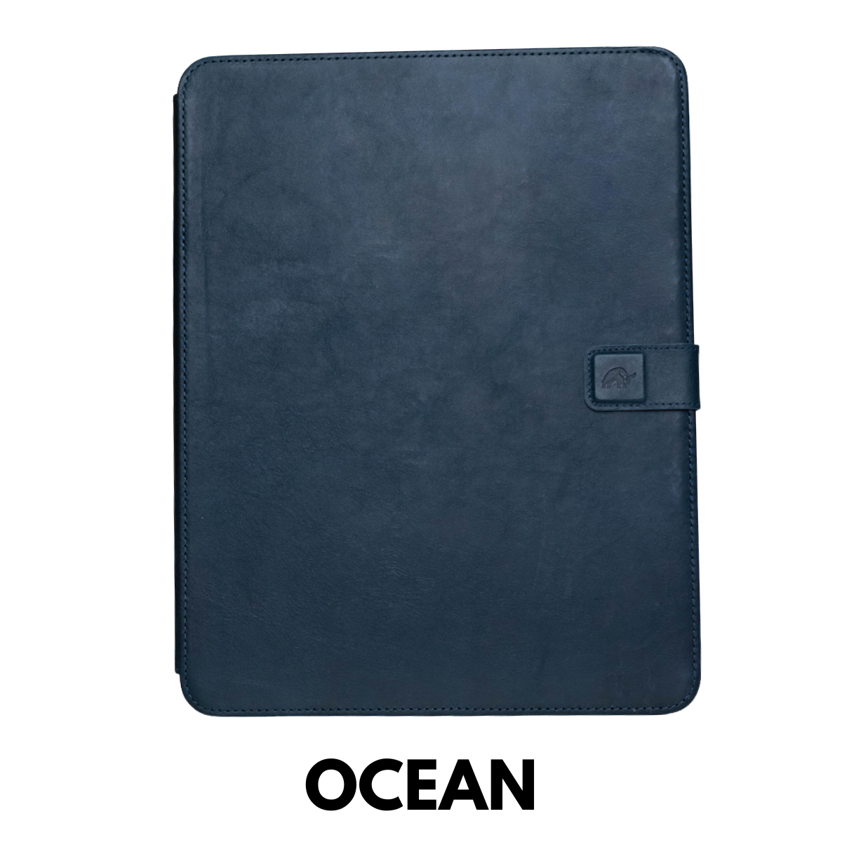 Leather folio iPad case in ocean blue with magnetic strap and embossed logo; OCEAN text below.