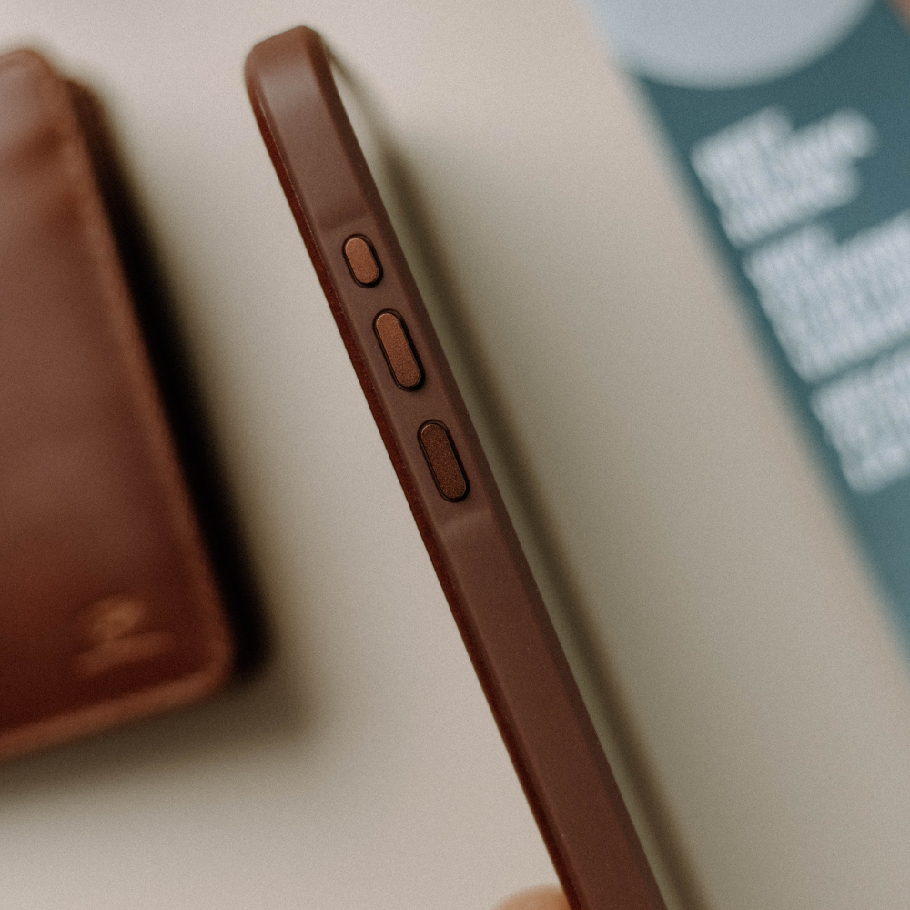 Close-up of the side buttons of the Flex Case - TERRA, showcasing its design and texture.