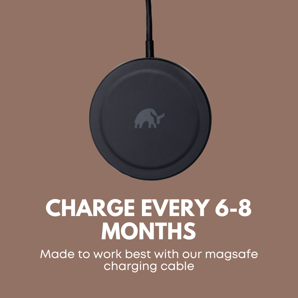 Round black MagSafe charger with elephant logo; CHARGE EVERY 6-8 MONTHS. Made to work best with our magsafe charging cable