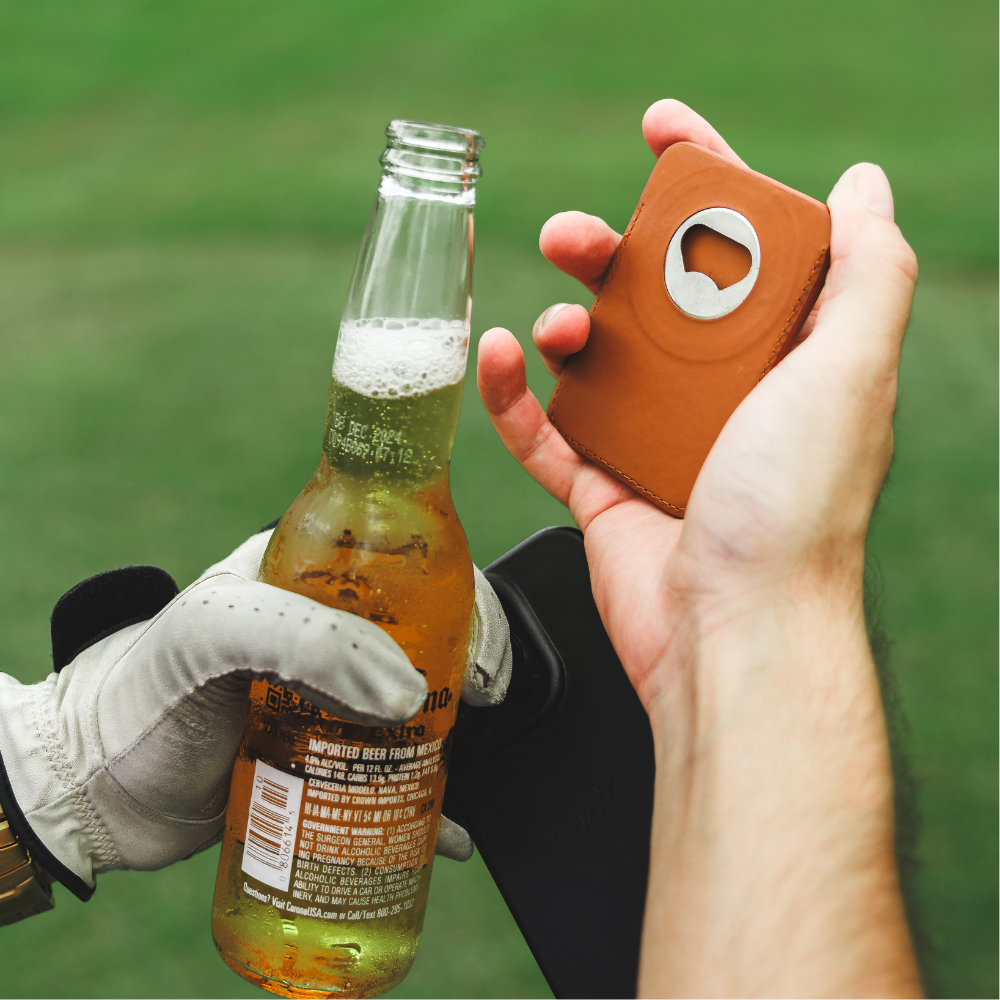 Sienna magnetic popper wallet with built-in bottle opener held over a beer bottle labeled "IMPORTED BEER FROM MEXICO"