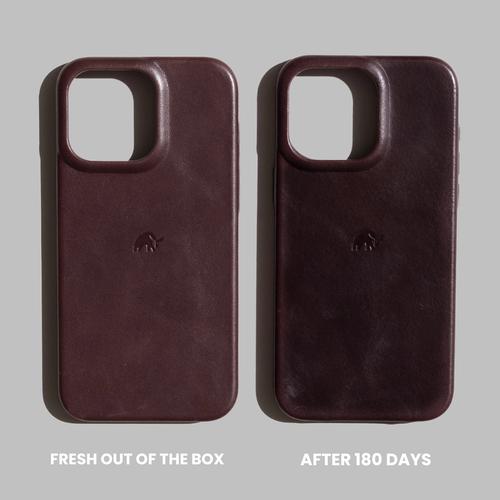 Two bourbon leather phone cases side by side — left FRESH OUT OF THE BOX; right AFTER 180 DAYS, darker finish.