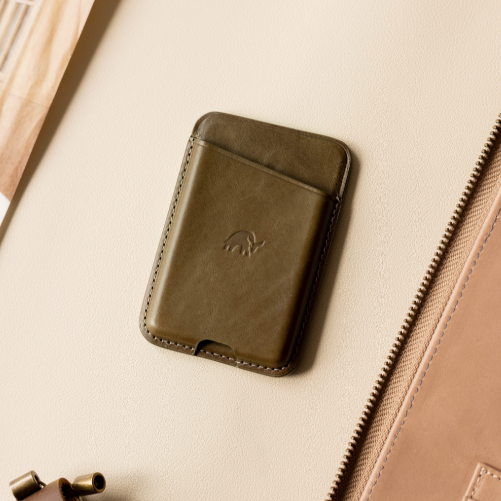 Maverick leather magnetic wallet on a beige surface