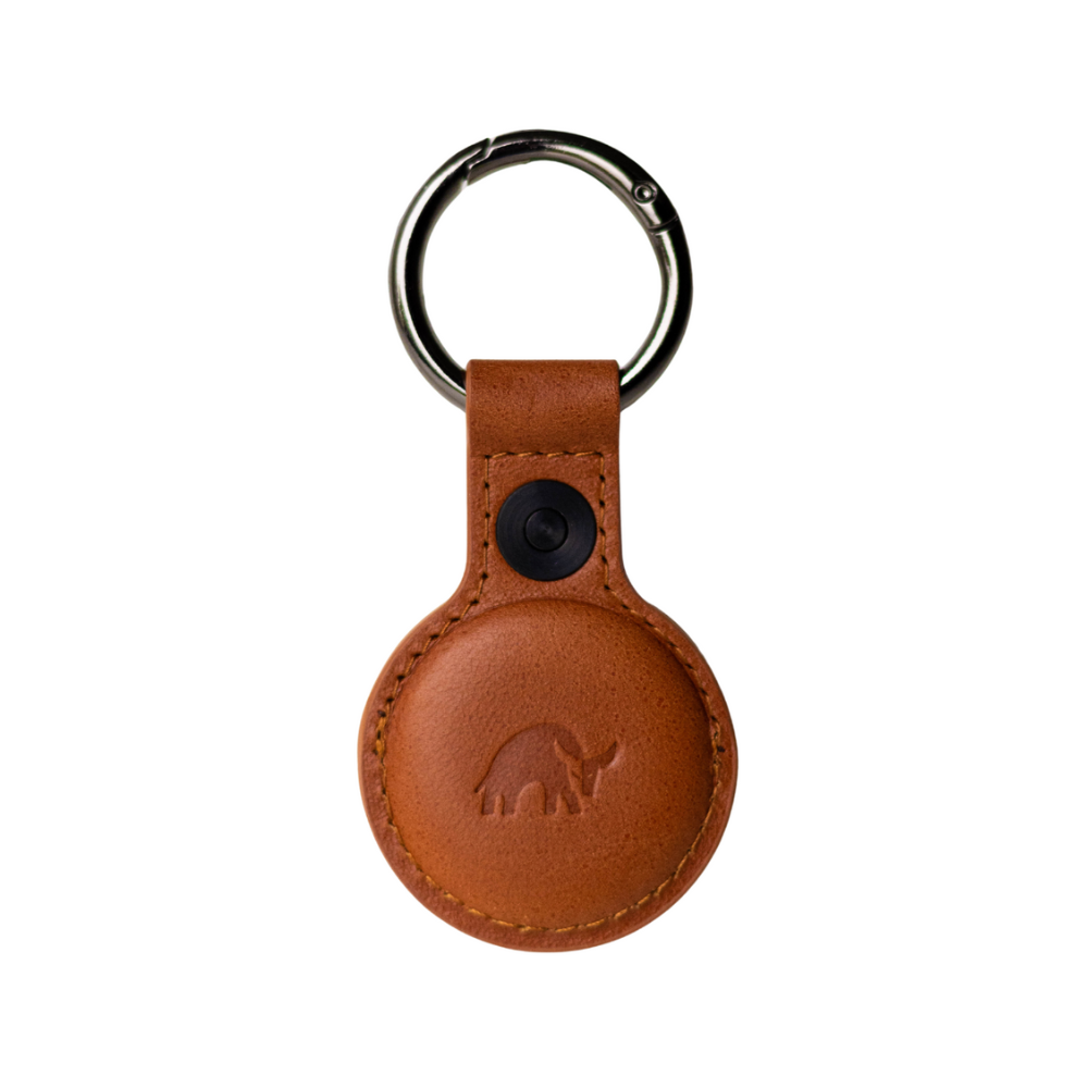 Brown leather keychain holder for AirTag with a bull logo