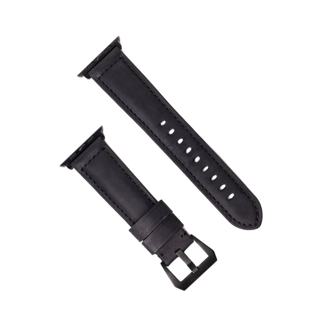 Black leather watch strap with buckle and holes for adjustment.