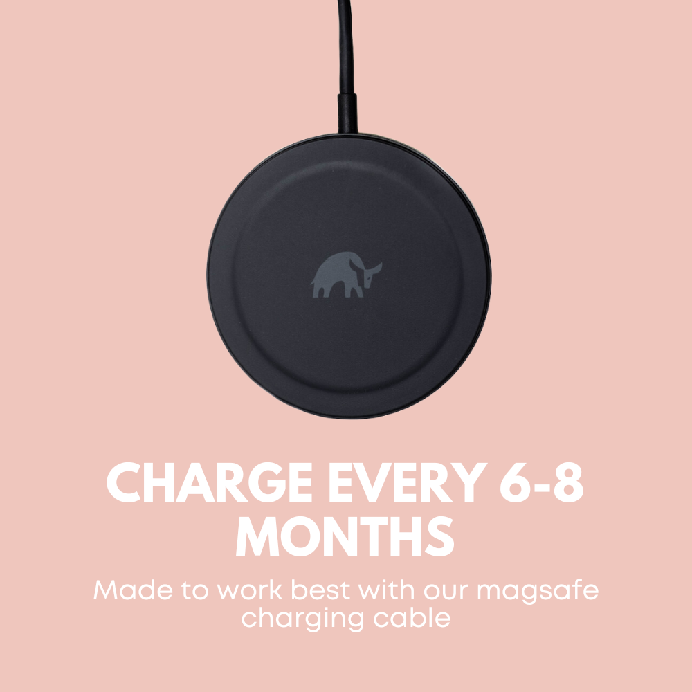 Wireless charging puck with bull logo. Text: CHARGE EVERY 6-8 MONTHS; Made to work best with our magsafe charging cable