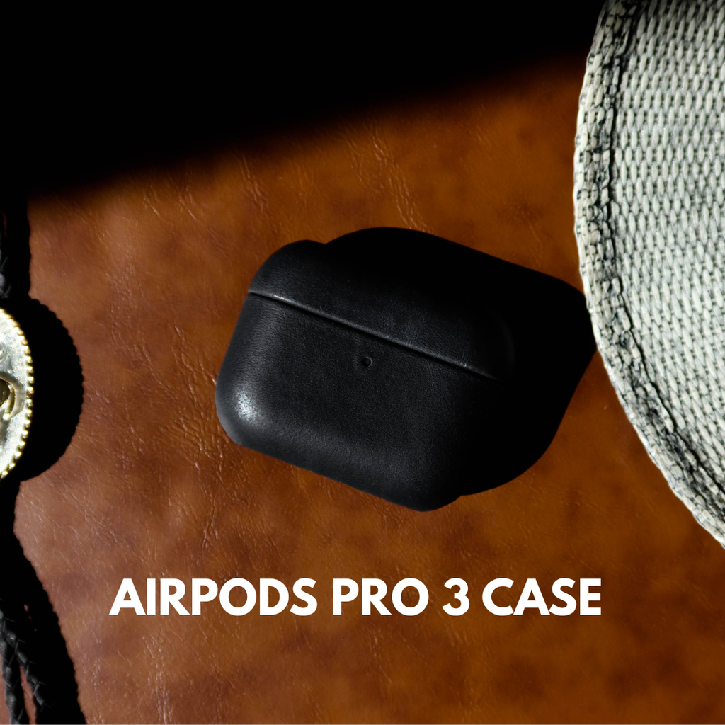 Top-down of black leather AirPods Pro 3 case on brown leather background, headline AIRPODS PRO 3 CASE