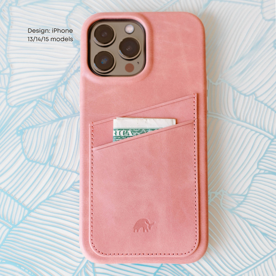 Pink leather iPhone case with card slot and a dollar bill peeking out.