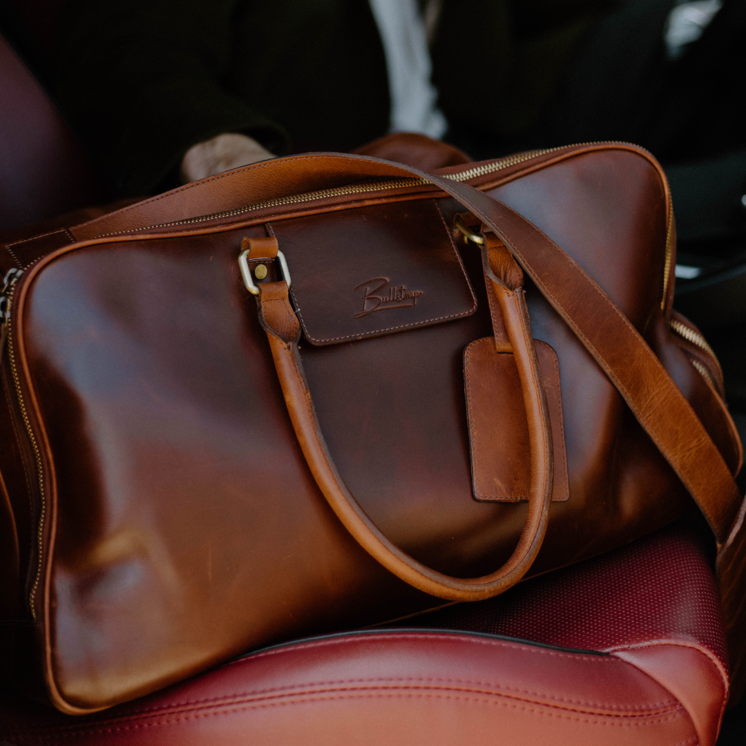 Brown leather Bullstrap Reserve - The Odyssey Travel Bag with a shoulder strap