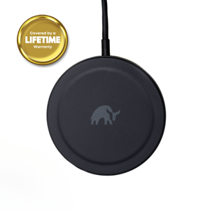 Black round MagSafe wireless charger with elephant logo; gold seal reading Covered by a LIFETIME Warranty