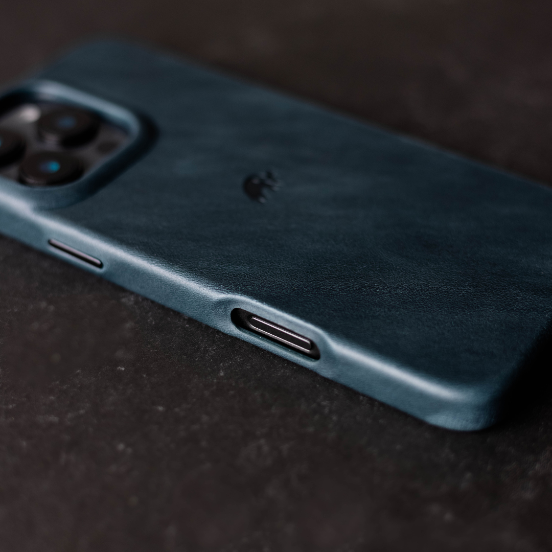 Close-up of The Minimalist Case in Ocean color, showing texture and cutouts.