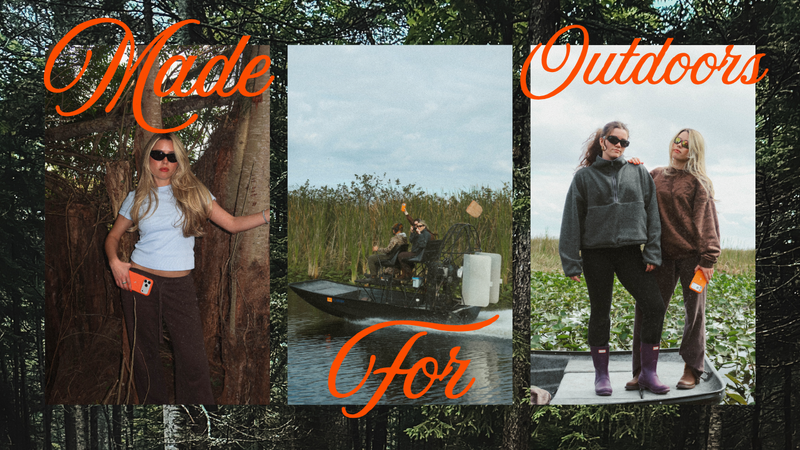 Two women on a small boat and a person in an airboat holding an orange iPhone case in marshland, overlaid script text 