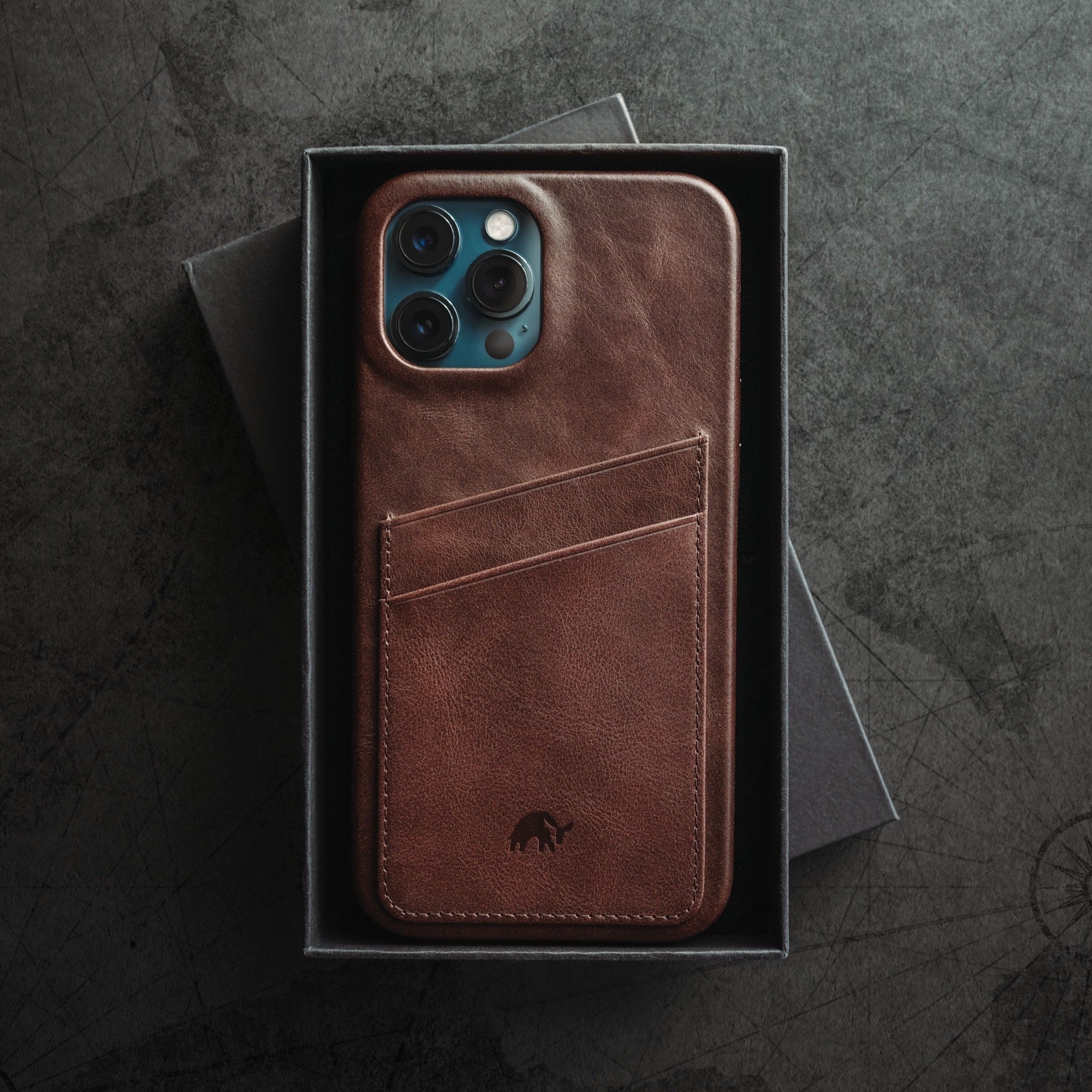 Brown leather iPhone case with card slot in a box