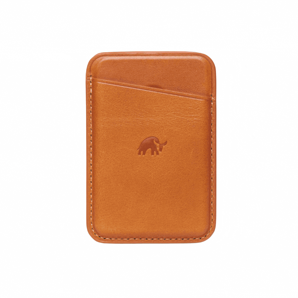 Front view of a brown leather magnetic wallet with an embossed elephant logo