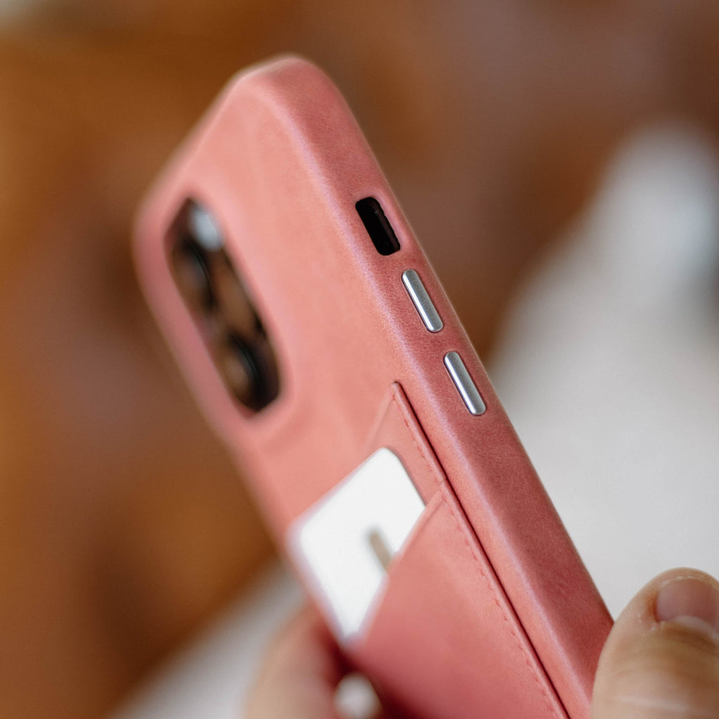 Close-up of the Minimalist Portfolio Case in SOUTH BEACH color, showing buttons and card slot.