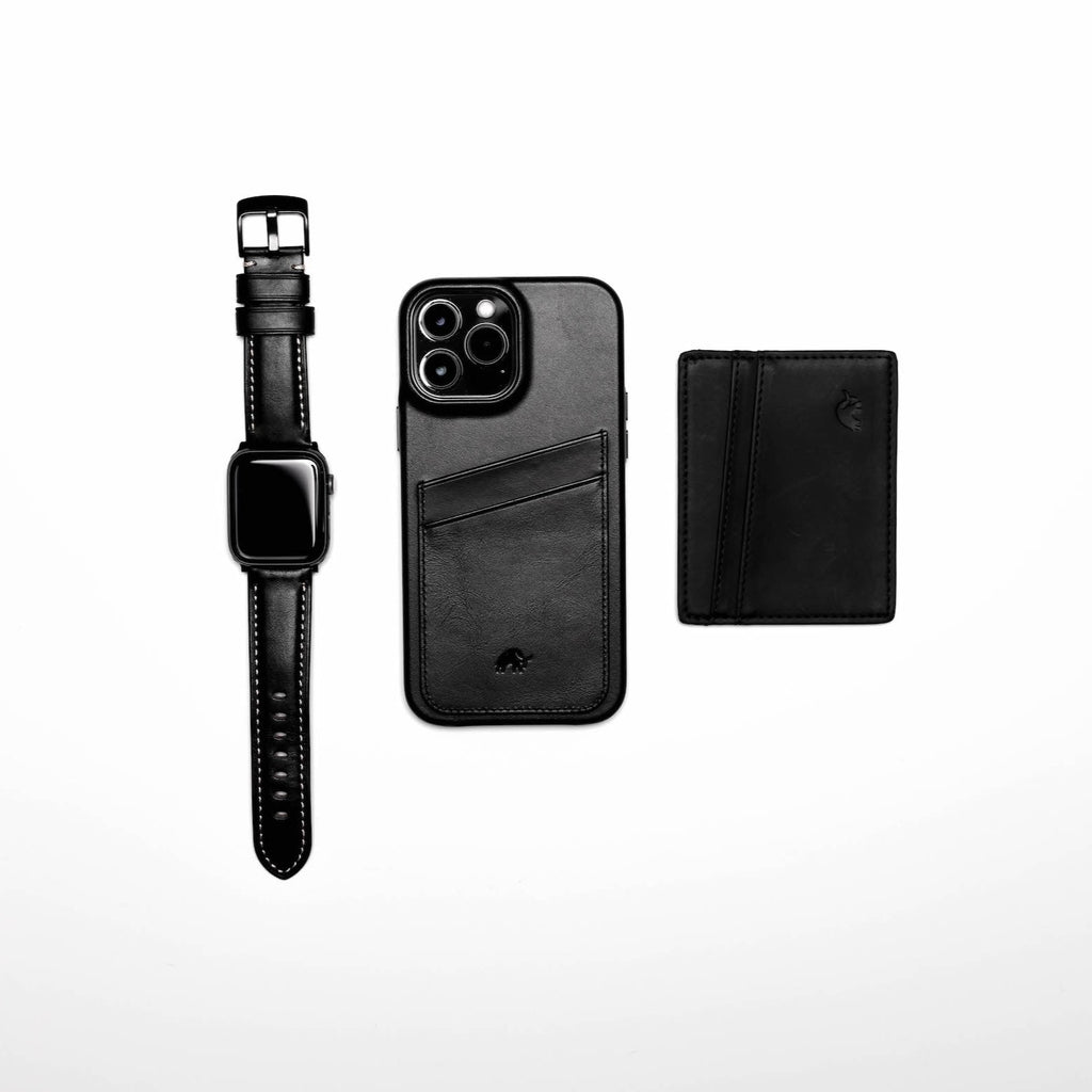 Leather Apple Watch Strap - Black Edition alongside a leather phone case and wallet