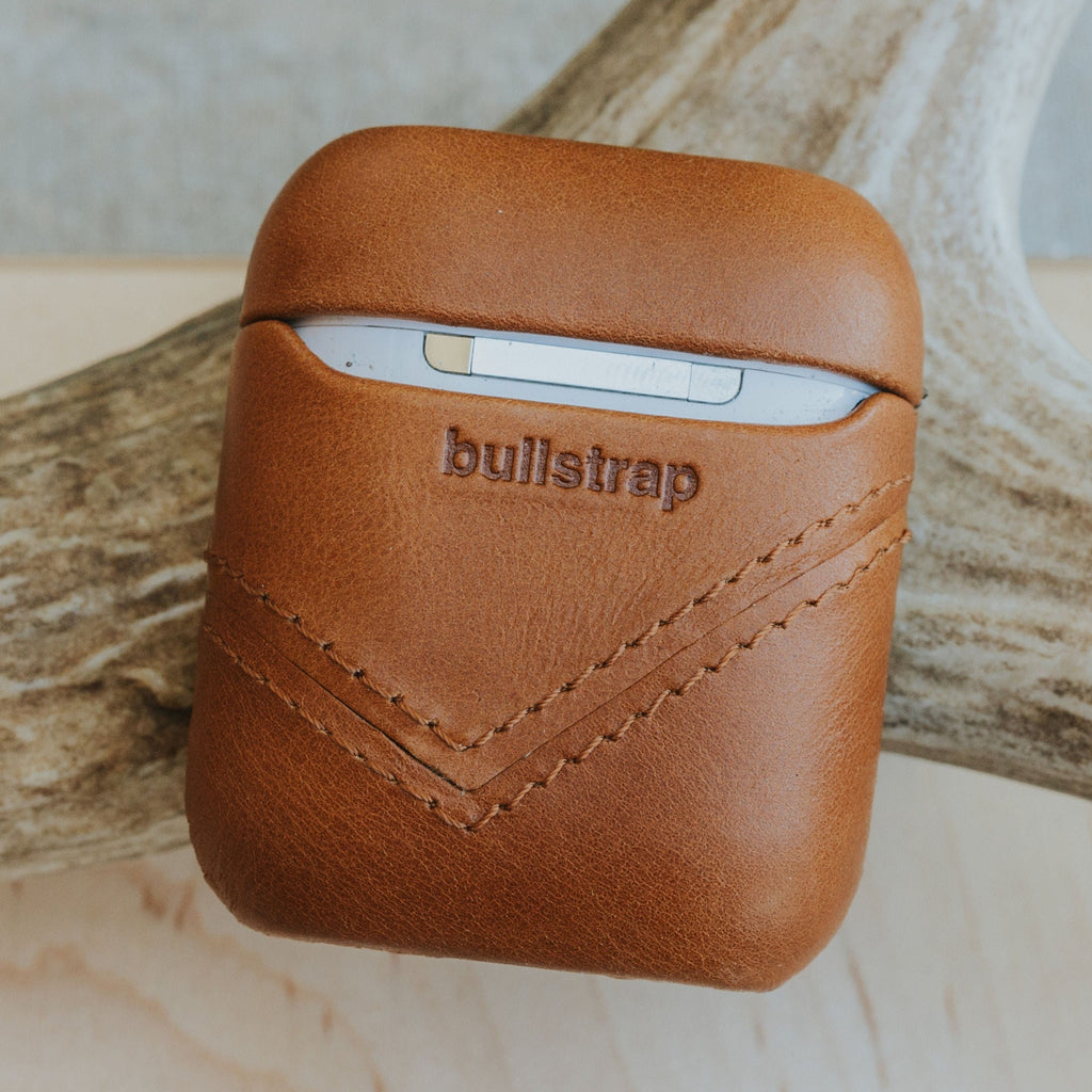 Bullstrap leather AirPods case in sienna color with embossed logo