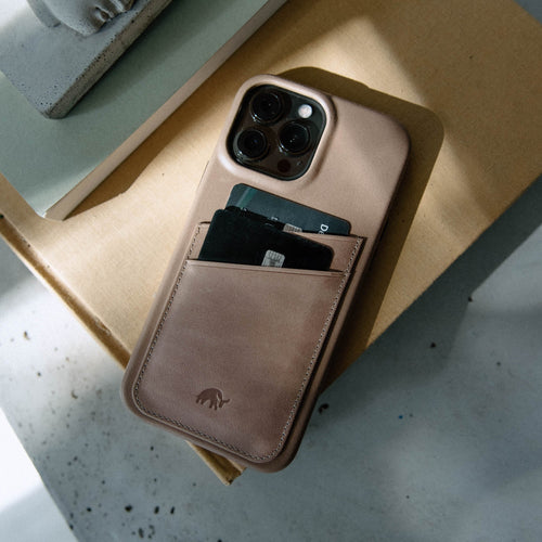 A DUNE colored Minimalist Portfolio Case with card slots, displaying cards.